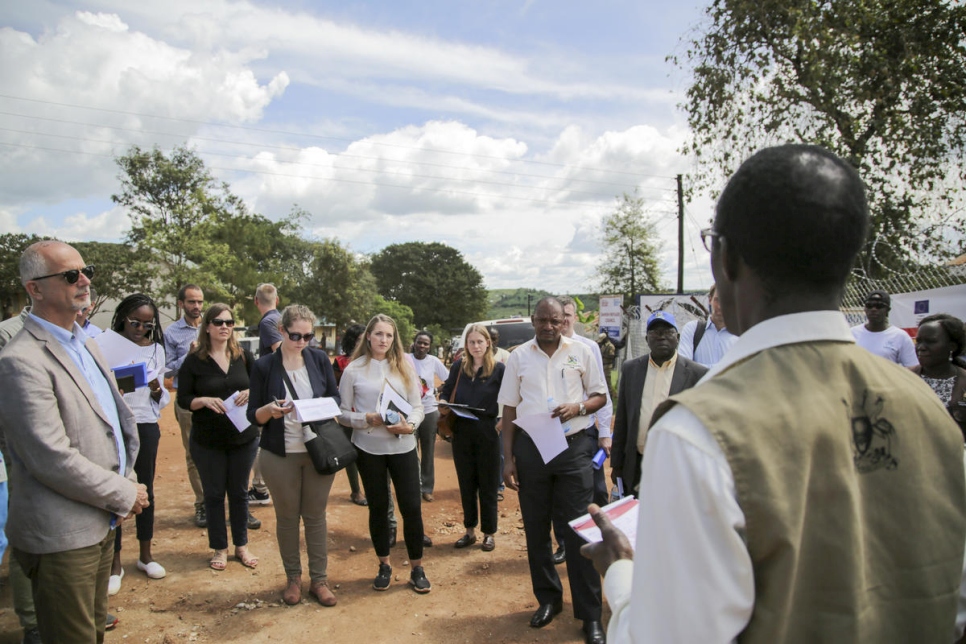 Uganda. Group of ambassadors and diplomats visit Kyaka II settlement