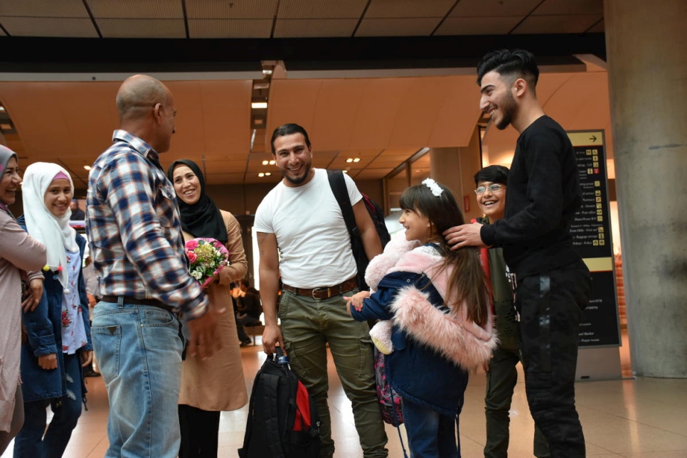 Refugee from Syria welcomes parents and siblings after family reunification in Germany
