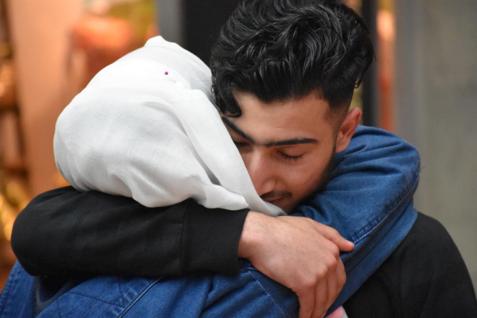 Refugee from Syria greets mother after family reunification in Germany