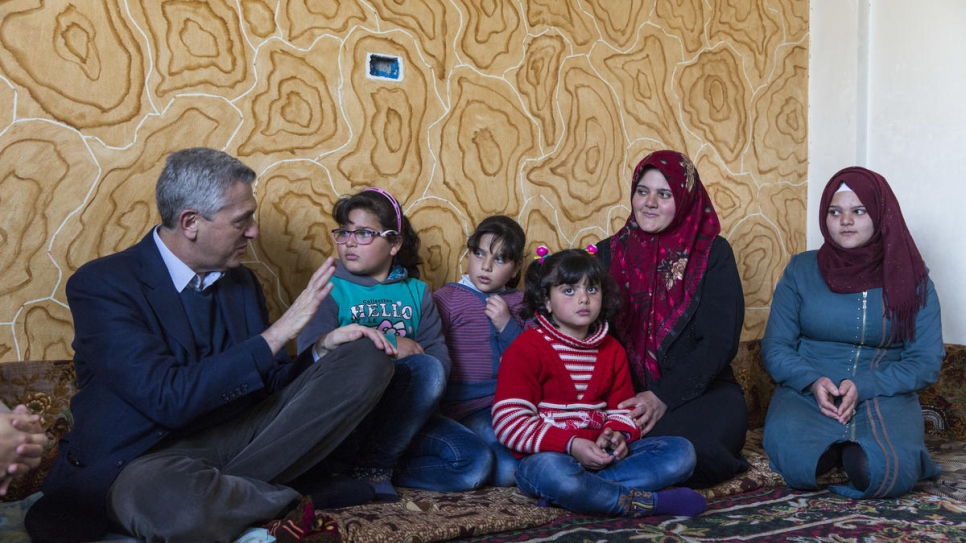 UN High Commissioner for Refugees Filippo Grandi meets Syrian returnee Zahida, 35, and her family at their home in Souran, Syria.
