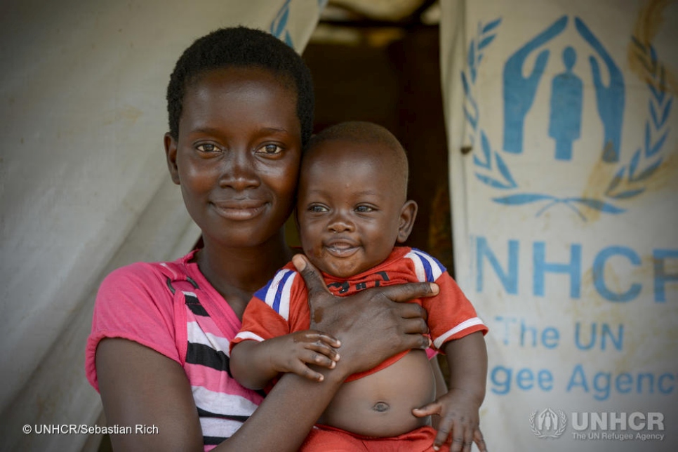 Tanzania. Burundi refugee family living in UNHCR shelter.