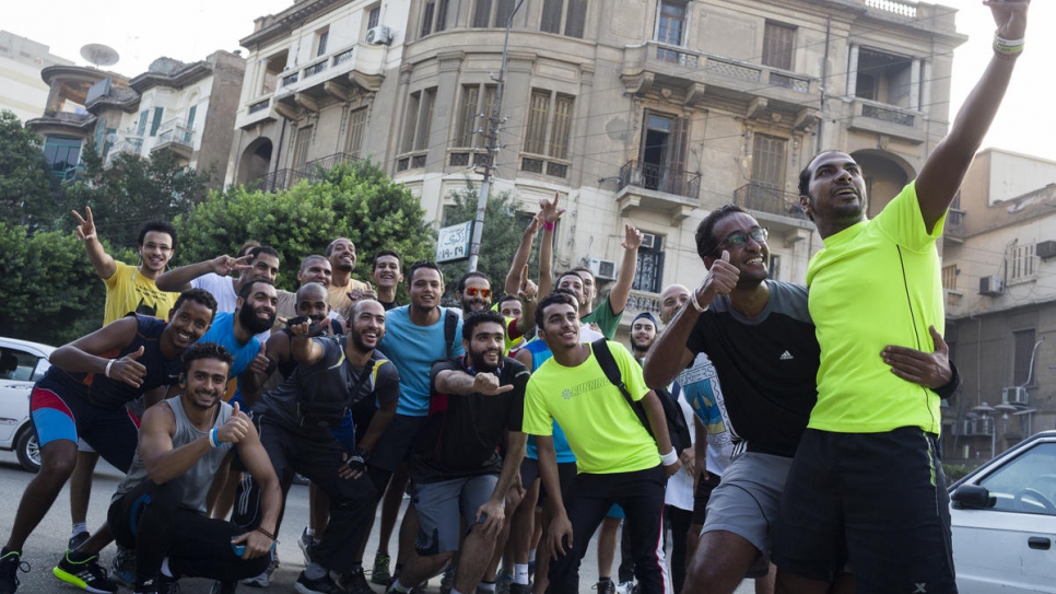 « La course à pied m'aide à surmonter les difficultés ou le stress que j'éprouve en tant que réfugié », dit Guled (à l'extrême gauche). 