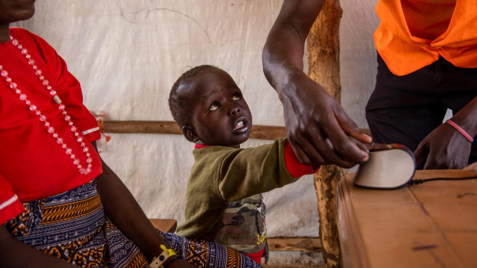 South Sudanese refugees register their arrival at Imvepi refugee settlement in Arua, northern Uganda.