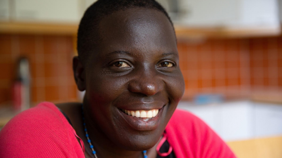 Nakout in the kitchen of her new flat in Vaasa, Finland – also home to hundreds of people who have fled conflict and persecution in east and central Africa.