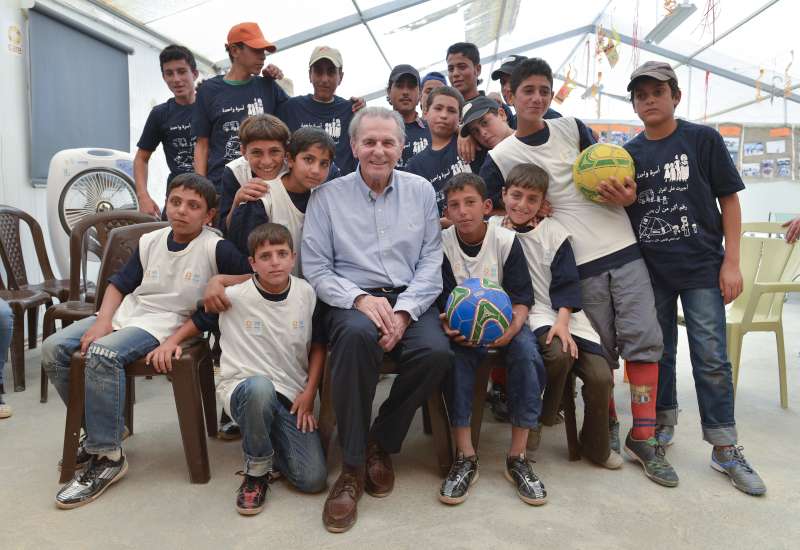 Ex-Olympics chief Rogge visits young Syrian refugees in Jordan with message of hope