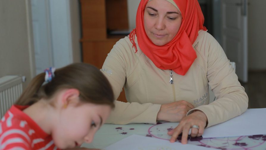 Darie Alikaj fled barrel bombs and mortar fire in Syria, leaving behind her job as a microbiologist. Now she mirrors a wider world of refugee survival in Turkey.