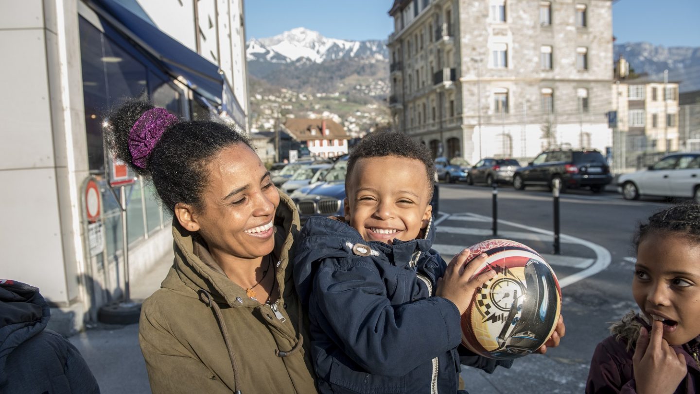 Switzerland. Family finally reunited and safe together, after two children were lost in the desert