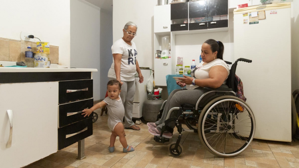 Gabriela Peña at home in the modest two-bedroom apartment in São Paulo that she and her family rented after being relocated out of Roraima. 