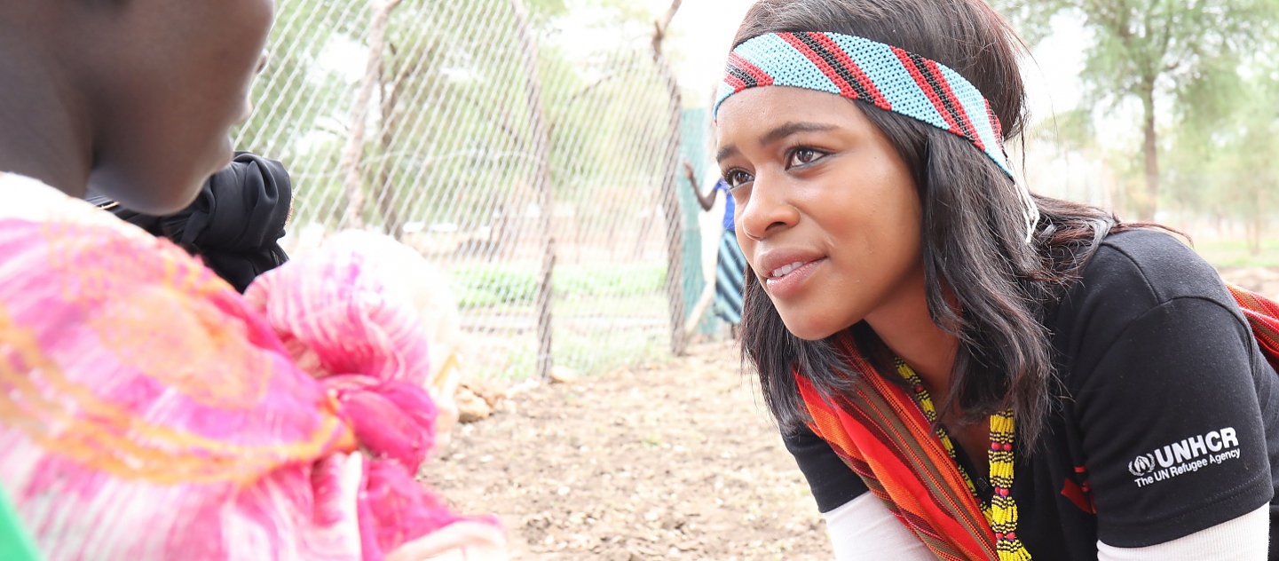 Nomzamo Mbatha talks to a Sudanese refugee at Doro Refugee Camp, South Sudan in May 2018.