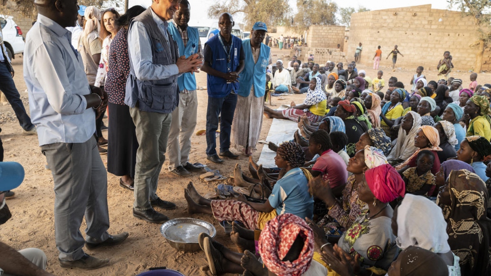 UN High Commissioner for Refugees Filippo Grandi meets with displaced Burkinabés in the town of Kaya in Burkina Faso's Center-North region