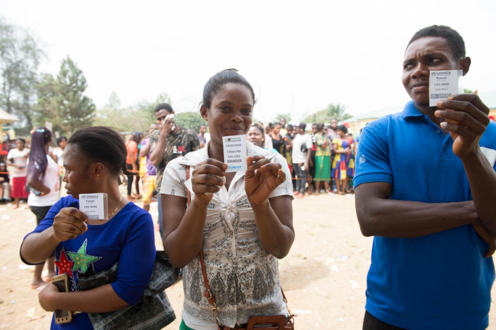 Nigeria. Cameroonian refugees wait to be verifed with their food tokens for relief materials and food distribution in Ikom