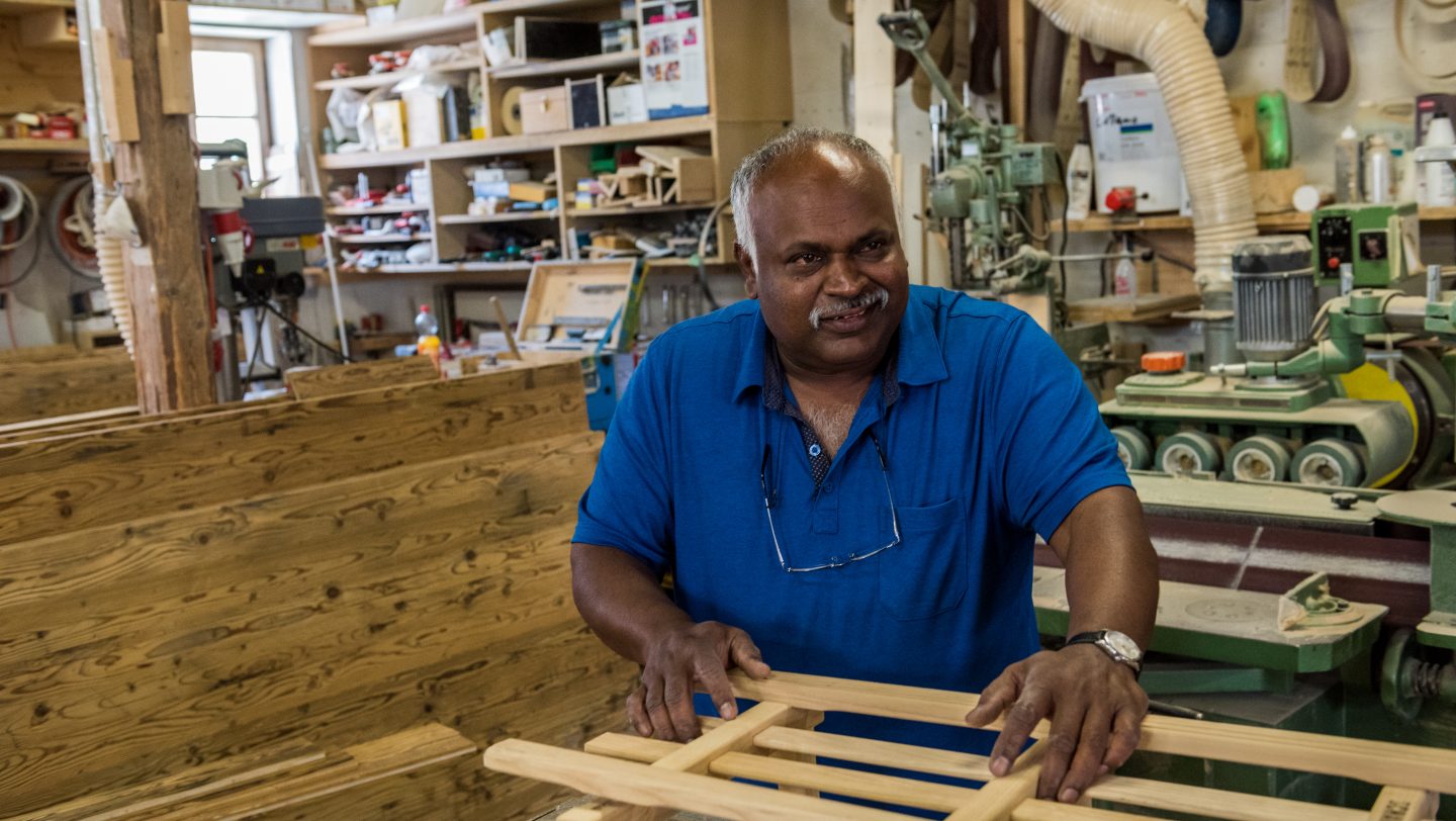 Switzerland. Successful Sri Lankan refugee sustains traditional culture in his host country.