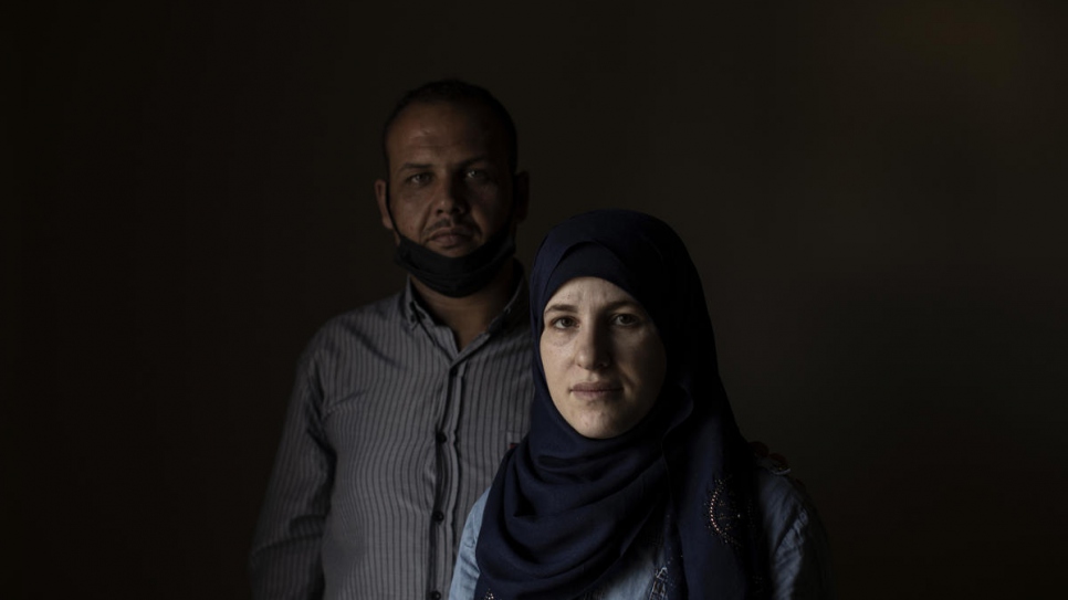 Wafaa, 32, and her husband Mohammad, 37, have their portrait taken at home in Barja, Lebanon.