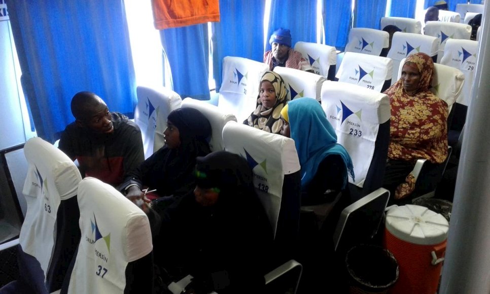Des réfugiés somaliens à bord d'un bateau vers la Somalie depuis le port d'Aden au Yémen. Avril 2019