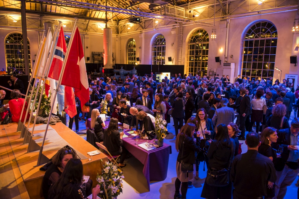 Invited guests enjoy the 2019 UNHCR Nansen Refugee Award ceremony reception in Geneva.