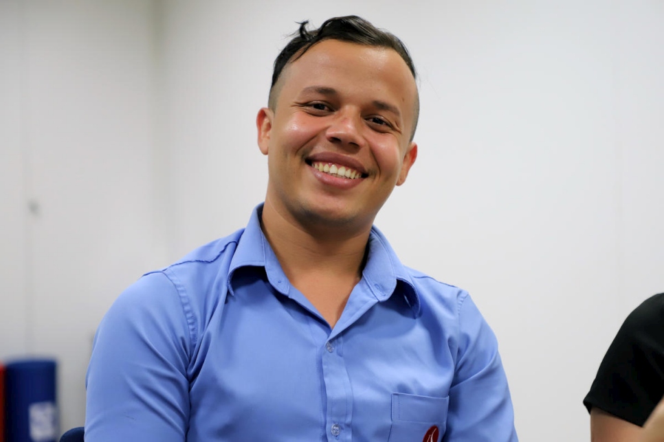 Brazil. LGBTI Venezuelan thrives at work after dramatic journey to survive