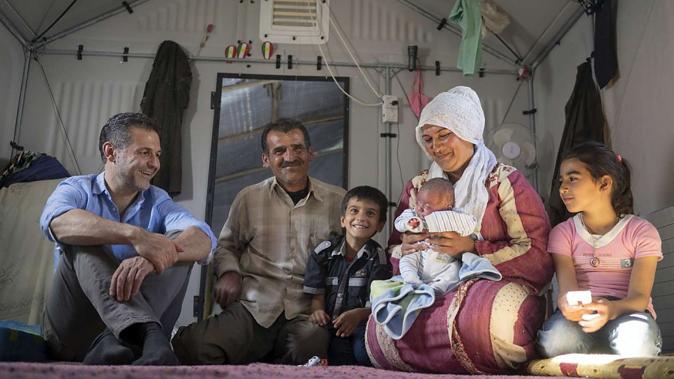 Khaled also met Amina and her family. She was three months pregnant when she and her family fled their home. After a difficult pregnancy, Amina's son was born three months prematurely and fought for his life. The Refugee Housing Unit has helped Amina's health but the family still misses their homeland. Mohammed's life had a turbulent beginning but now hopefully his story will continue peacefully.