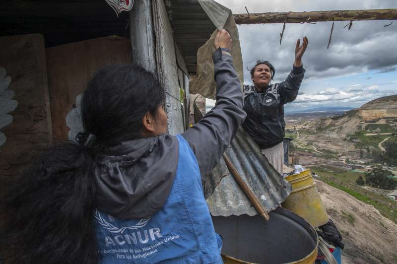 Diana, an internally displaced person, attends to a shelter at Altos de la Florida, Colombia. [for translation]