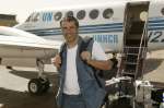UNHCR Goodwill Ambassador Julien Clerc arrives at the airport in eastern Chad on March 2, 2004.