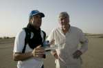UNHCR Goodwill Ambassador Julien Clerc talks with the UN High Commissioner for Refugees, Ruud Lubbers, in AbÃ©chÃ©, eastern Chad. March 2, 2004.