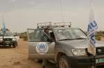 Visiting refugee sites in eastern Chad involves driving through harsh desert terrain. March 3, 2004.