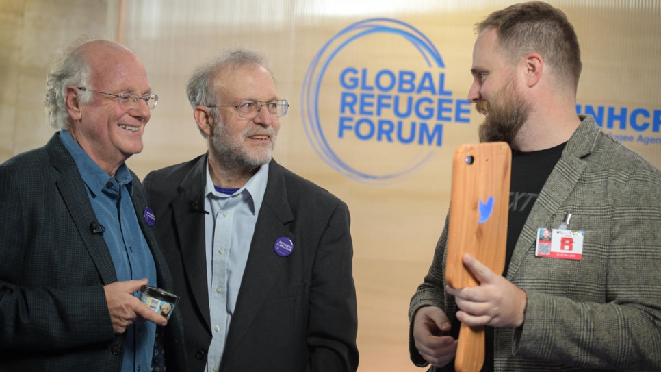Ben Cohen (left) and and Jerry Greenfield, founders of Ben &amp; Jerry's ice cream, visit the Global Refugee Forum.