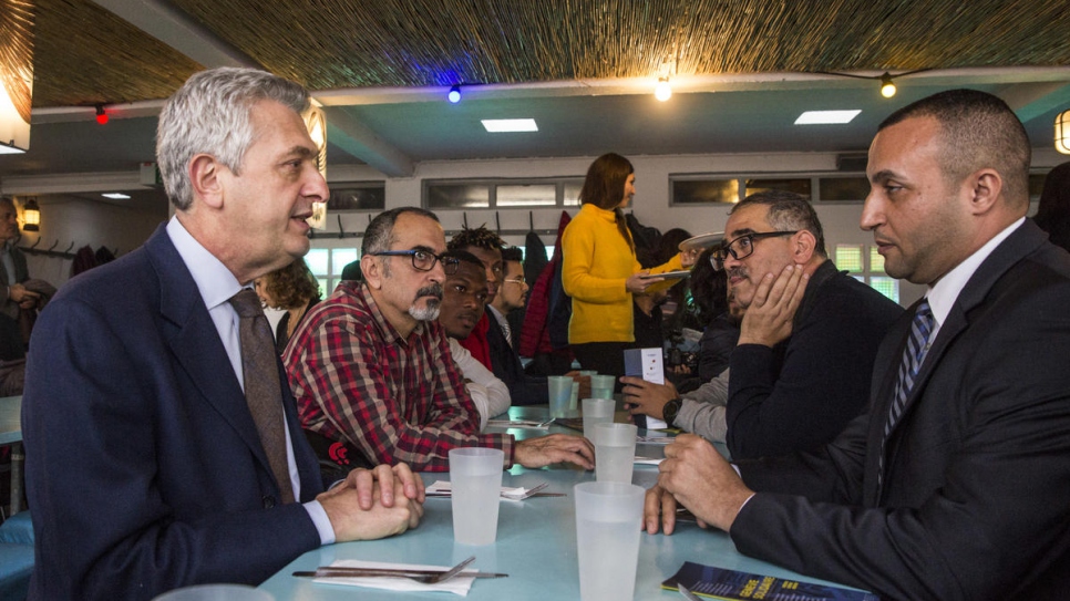 The popular restaurant at the lakefront Bains des Pâquis baths provides lunch for a group of refugees on the occasion of the Global Refugee Forum