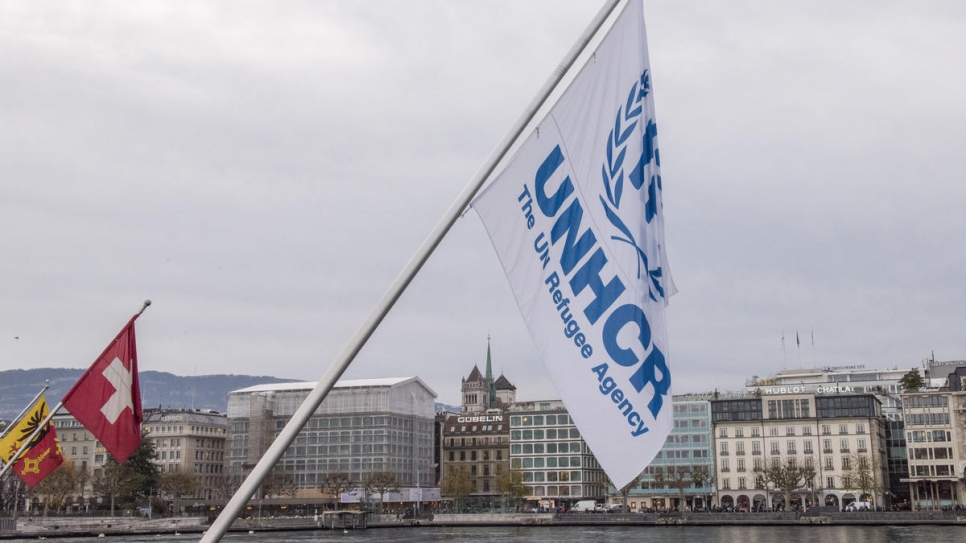 UNHCR's flag flies alongside those of Switzerland and the Canton of Geneva on the Pont du Mont Blanc, where the Rhone flows out of Lake Geneva.