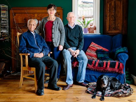 United Kingdom. Hilary and Jim Parle host 72-year-old Eritrean Yonasskindis*, who was on the verge of homelessness after his original asylum request was rejected by UK authorities, in Birmingham. This portrait is part of Great British Welcome, the UK chapter of the ongoing No Stranger Place series,