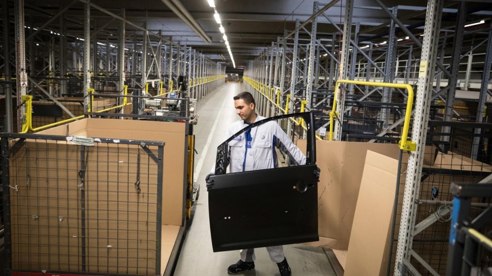 Mohammad Al Jaser, a trainee, at work at the VW plant in Baunatal, Germany.