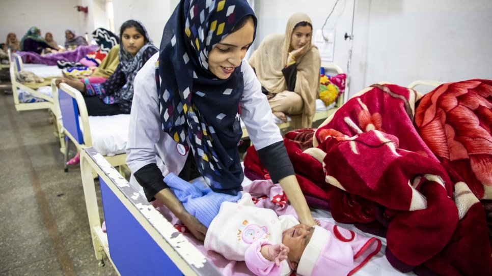 Saleema treats babies and their mothers at the hospital. 