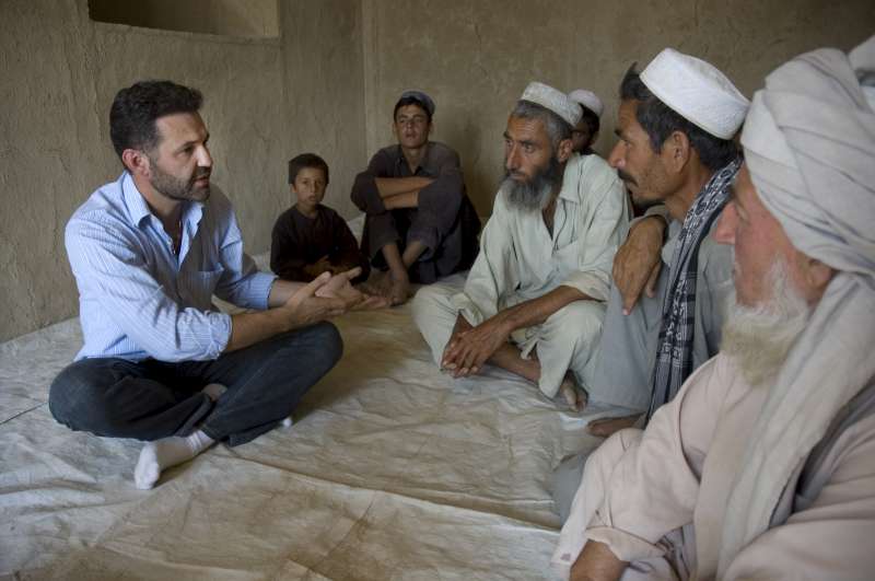 Khaled Hosseini hears from village elders in Baghlan province about the conditions his community is facing. This cluster of 24 families in Darkhat has no drinking water, medical facilities or schools.