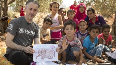 Lebanon. UNHCR High Profile Supporter Alan Cumming visits mobile library at Rass Maska informal settlement.