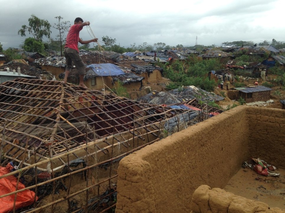 Refugees in Kutupalong camp rebuild their homes after Cyclone Mora tore through the area on 30 May 2017.