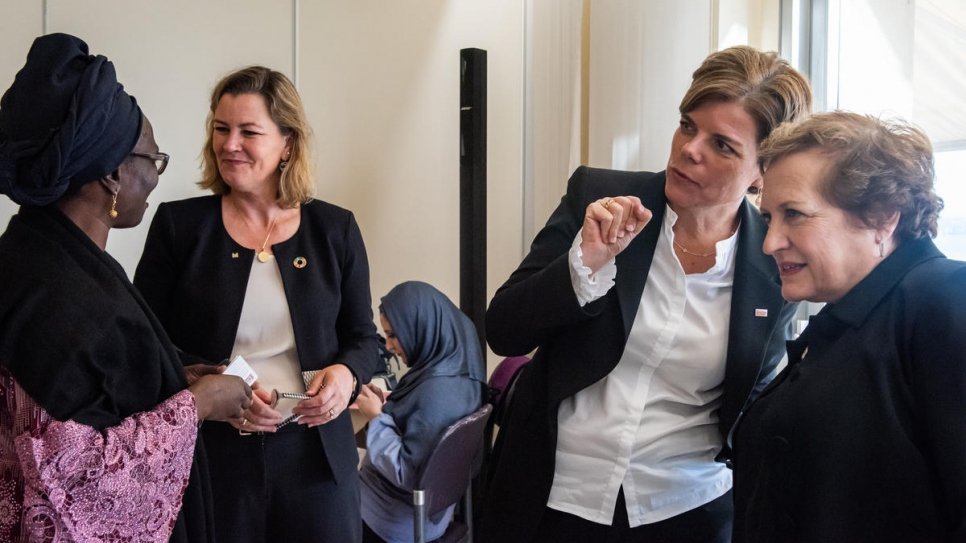 Deputy High Commissioner Kelly Clements hosts a round-table lunch for women, including refugees, to discuss ways of removing barriers to refugee women's inclusion in decision making.