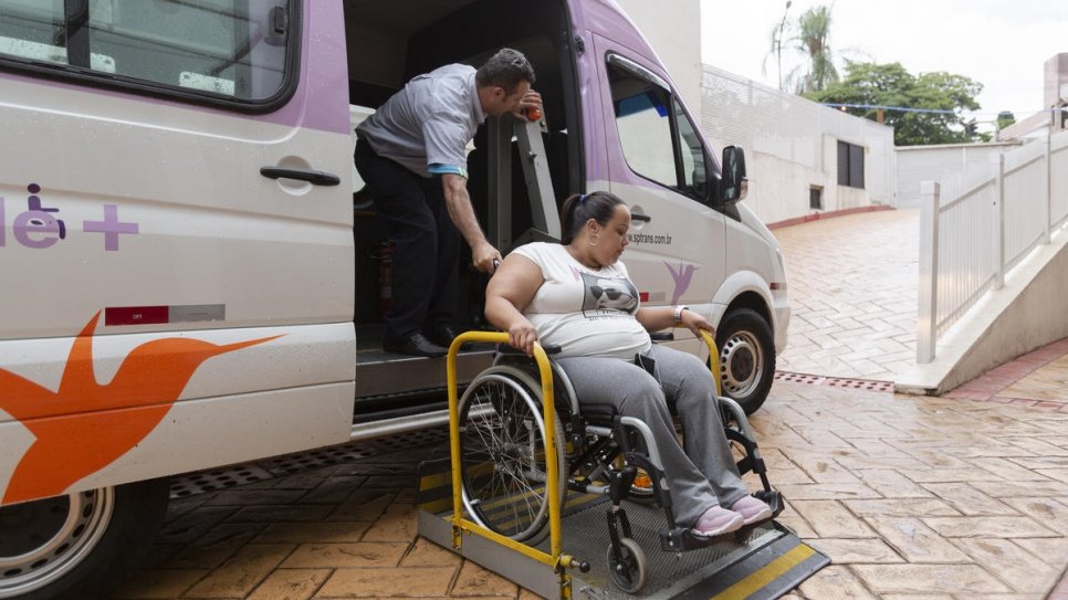 Gabriela Peña boards the van that takes her to and from her job in São Paulo, Brazil.