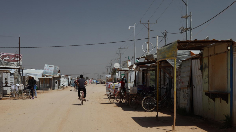 Za'atari's main shopping street stands largely empty as people stay indoors.