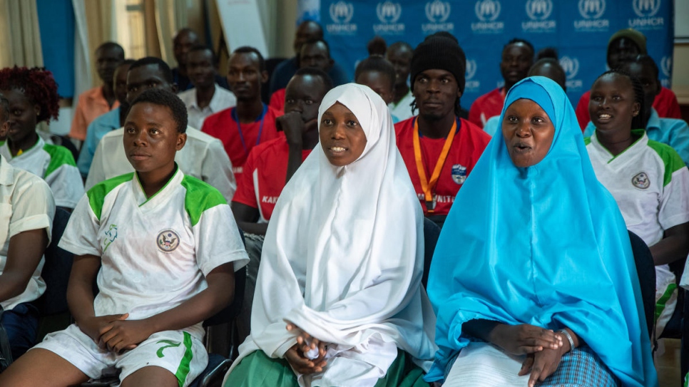 Ayan John (blue veil) speaks from Kakuma refugee camp in Kenya during a live-link with an event in London, where football star Mohamed Salah was introduced as the first ambassador for Instant Network Schools.