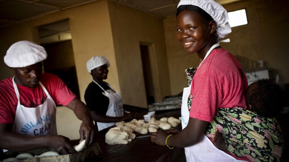 Marie (right) was kidnapped for eight months by the Lord's Resistance Army when she was 14. Now 20, she works as a baker at  Sister Angelique's centre in Dungu, in the Democratic Republic of Congo. 