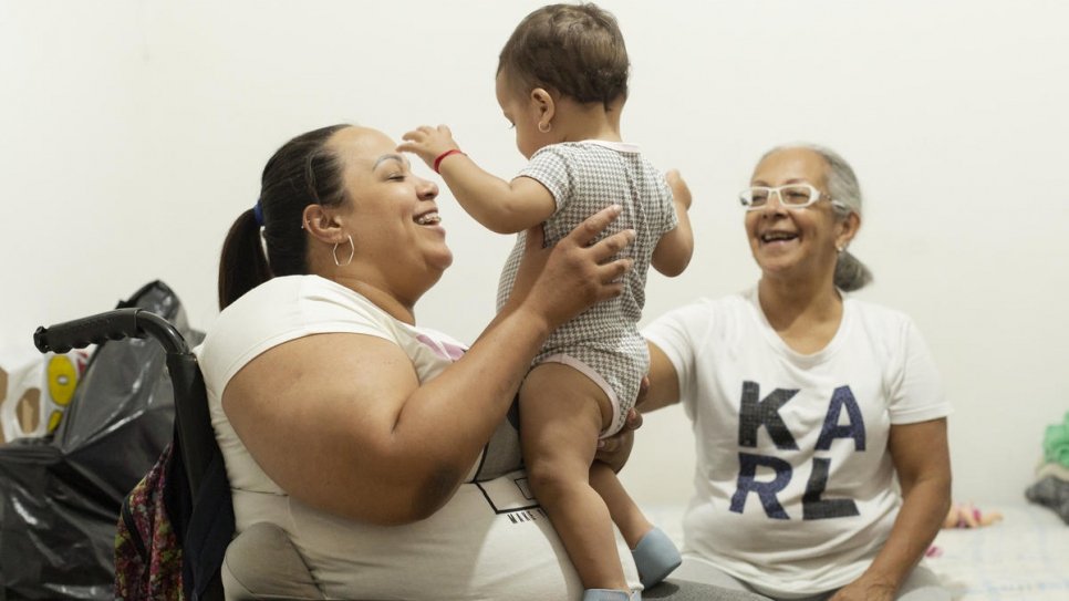 Gabriela Peña spends time with her mother and one-year-old niece in the rental apartment in São Paulo the family shares thanks in part to Gabriela's steady pay check.