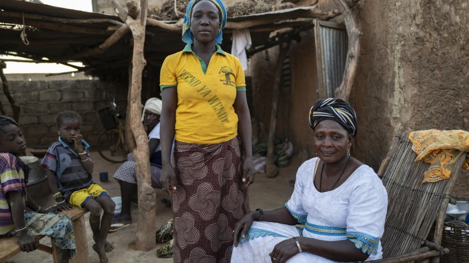 Rinata Baguigna (left) sought safety at district leader Diambendi Madiega's home in Kaya. Madiega's sister Tipoko Ouedraogo (right) is also hosting internally displaced people.