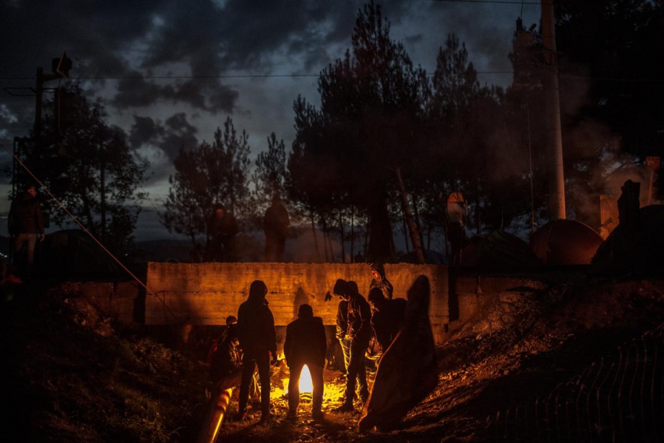 As temperatures in Greece drop, refugees and migrants burn what they can find to stay warm.