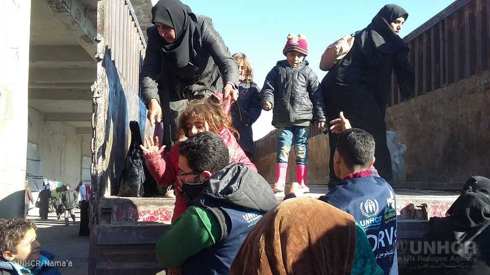 Families arriving from East Aleppo to Mahalej shelter