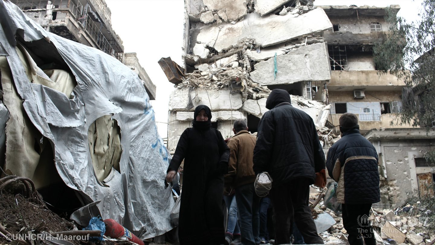 People from East Aleppo visits to check on their damaged houses