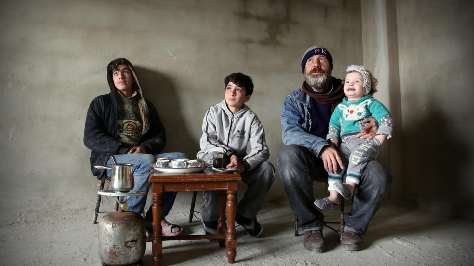 Abdelrahman (left), describes how he was forced to flee his home in Homs with his brother Abdelmalik, father Jihad and little sister Habiba.