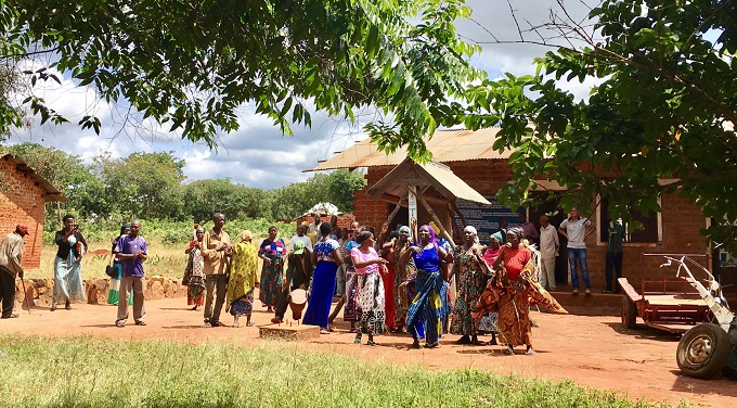 A group of women dancing outside
