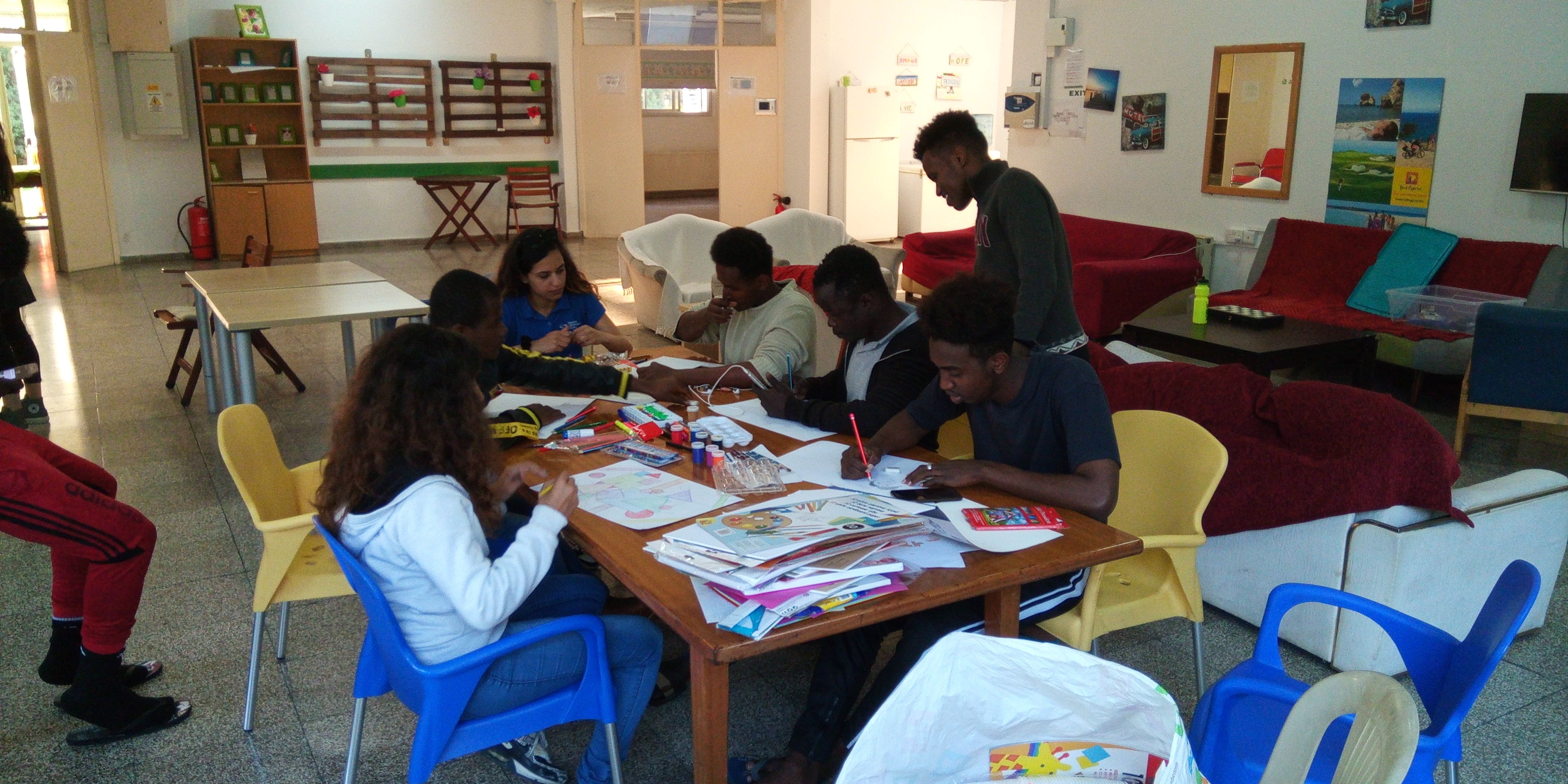 People seating around a table, drawing. 