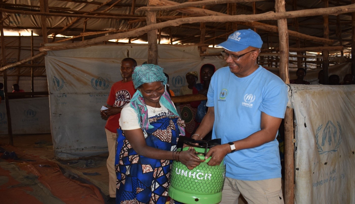 A woman is given a LPG gas stove