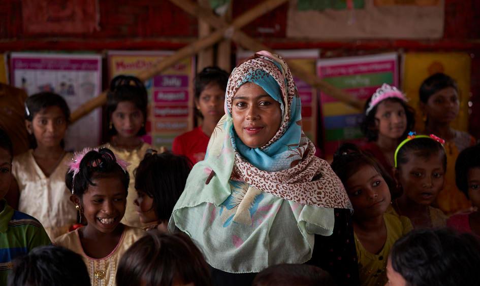 Teacher with pupils in a classroom