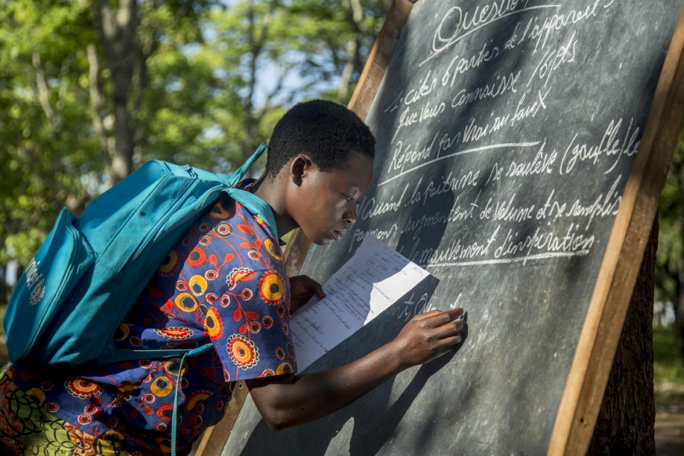 Tanzania. Refugee children battle the elements to learn